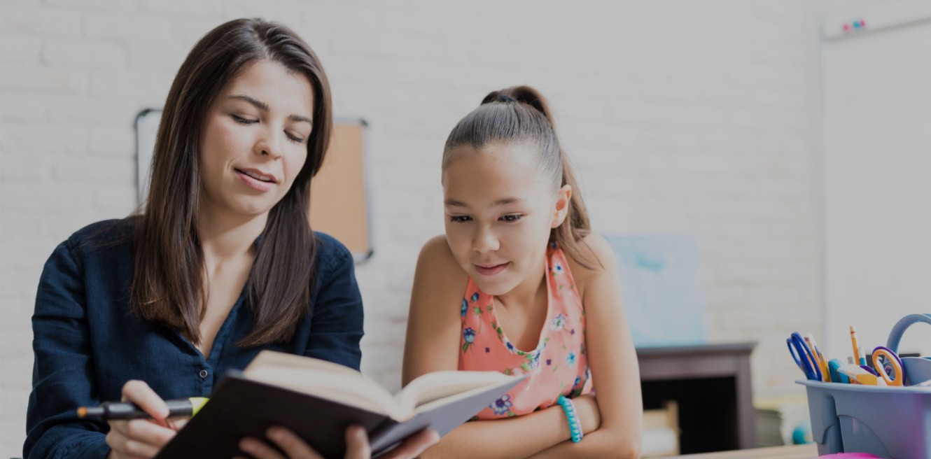 Woman tutoring a student at home